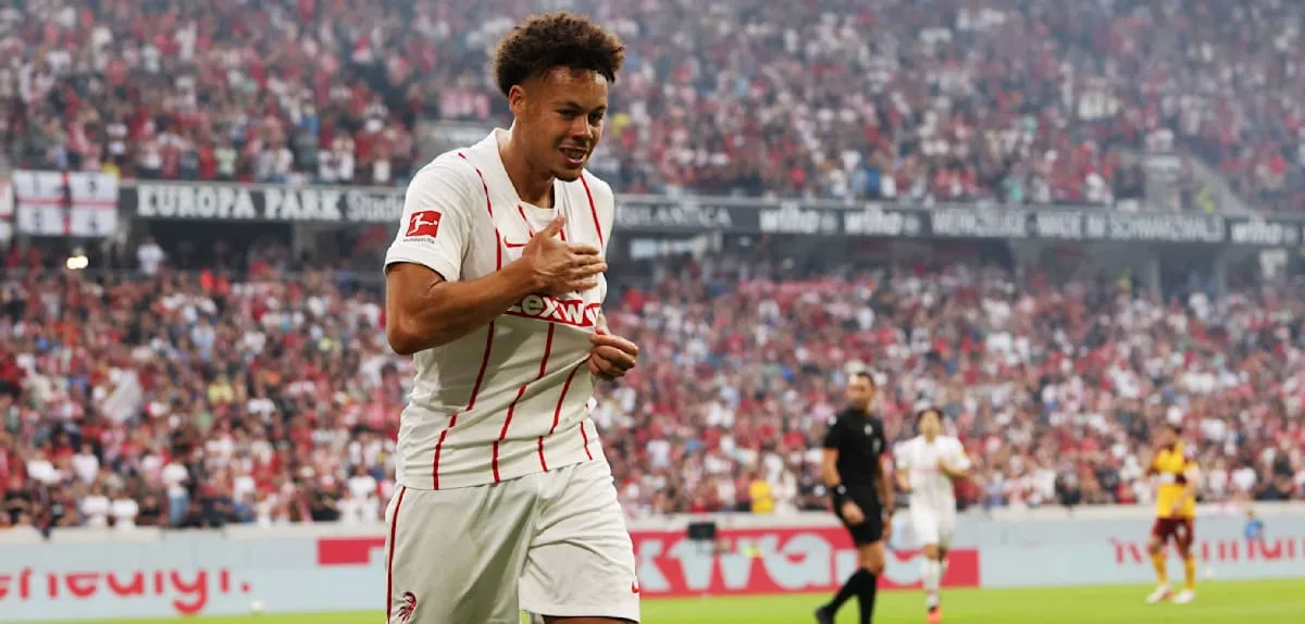 Freiburg's Goal Fest: Scherhant Shines as Backhaus Fails Motherwell