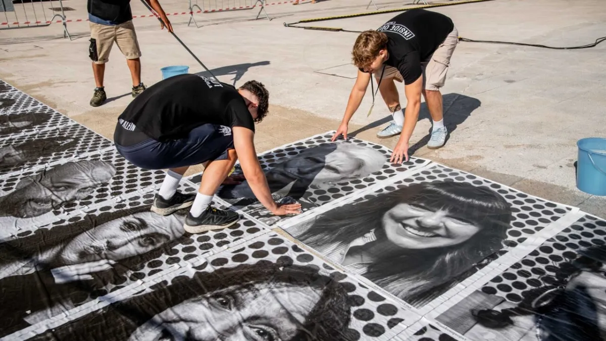 Thousands of Faces in L'Aquila: JR's Art Reveals Disaster Memory, Unites Community