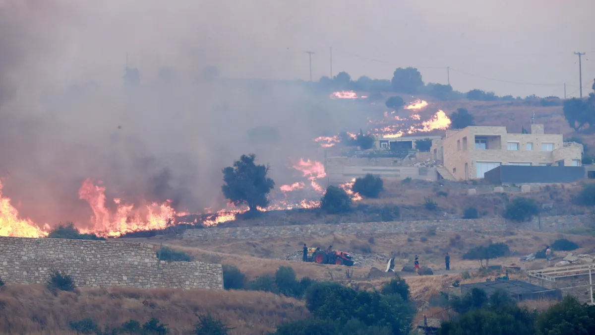 Crete Engulfed by Wildfires, Thousands Evacuated Amidst Fierce Winds