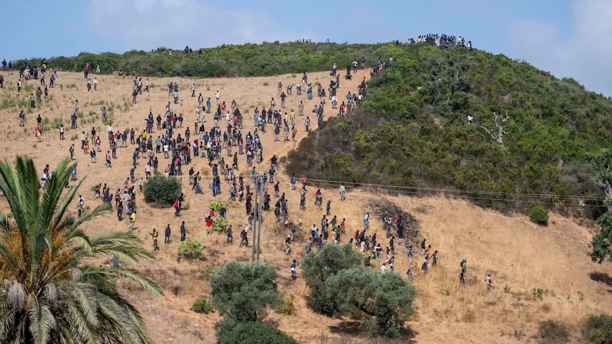 Rabat Clashes at Ceuta Border: Hundreds of Migrants Trapped by Tear Gas